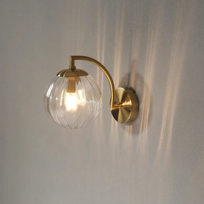 Lampe de Chevet Mural Globe en Verre et Laiton - Éclat Nocturne