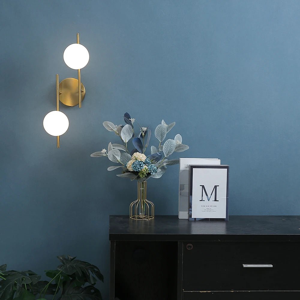 Lampe de chevet Murale Double Sphère Dorée - Éclat Nocturne